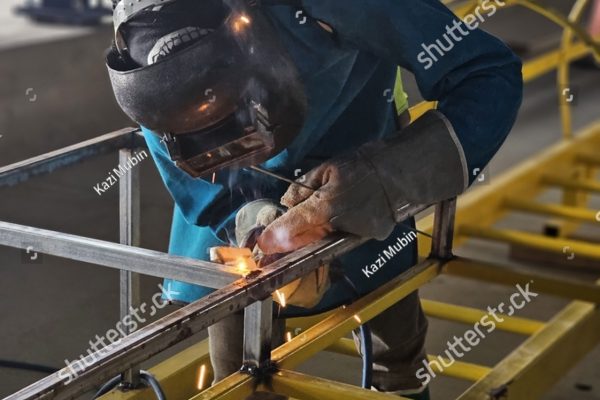 stock-photo-a-man-welding-a-metal-structure-2283202887